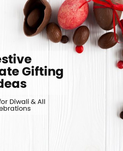 Assorted chocolate gift boxes and hampers decorated for Diwali with traditional Indian festive ornaments.